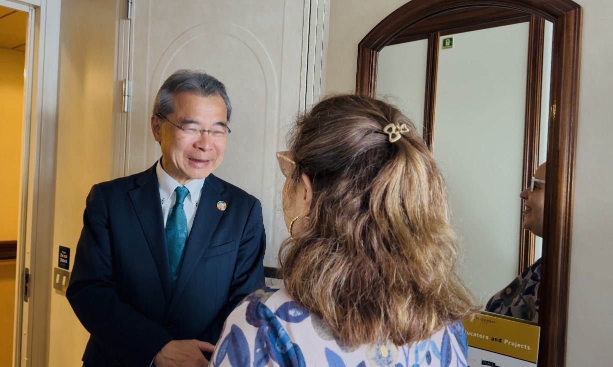 Yoshioka Tatsuya welcoming Patricia Vlieg aboard Peace Boat